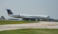 N13988 @ KMKE - EMB-145LR - by Mark Pasqualino