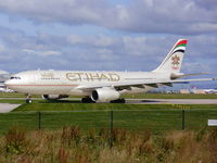 A6-EYF @ EGCC - Etihad Airways Airbus A330-243 (cn 717) - by chrishall