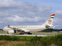 A6-EYF @ EGCC - Etihad Airways Airbus A330-243 (cn 717) - by chrishall