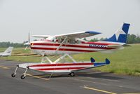 N756SG @ SOP - Awaiting rain..... - by John W. Thomas