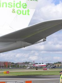 G-APSA @ EGLF - DC-6 dwarfed by the A380 at Farnborough