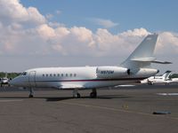N97GM @ KTEB - 2000EX on the ramp - by Tom Cooke