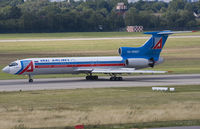RA-85807 @ EDDL - Rolling out on rwy 23L. Observe Grey radome and reversers extended.