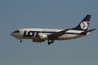 SP-LKF @ EBBR - arrival of flight LO235 to rwy 25L - by Daniel Vanderauwera