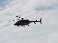 N575NE @ KLNK - NE STATE PATROL HELICOPOTER JUST AFTER LIFT OFF - by Gary Schenaman