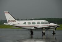N331MB @ TTA - At rest - by John W. Thomas