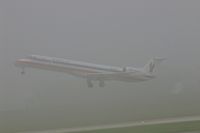 N629AE @ CID - Departing runway 9 in the early morning fog.  Seen from my office window on the second floor of the control tower. - by Glenn E. Chatfield