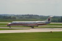 N736DT @ CID - Take-off roll on Runway 13. Seen from second floor window of the control tower. - by Glenn E. Chatfield
