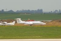 N25FM @ CID - Sitting way on the west side, seen from my dirty office window in the control tower.