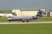 N906SW @ CID - Take-off roll on Runway 13. Seen from second floor window of the control tower.