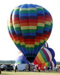N9802S @ N51 - A colorful balloon prepares for lift off into the summer evening sky. - by Daniel L. Berek
