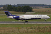 4O-AOM @ VIE - Montenegro Airlines Fokker F-100 - by Juergen Postl