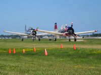 N1328B @ OSH - N194RR bring up the rear at Airventure 2008 - Oshkosh, WI - by Bob Simmermon