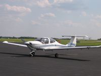 N104JA @ KGSO - DA 40 - by Tom Cooke