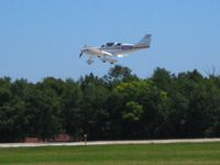 N321DF @ OSH - Landing on 36 at Airventure 2008. - by Bob Simmermon