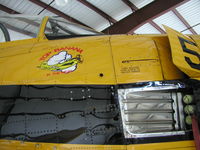 N128JC @ KLVN - Julie Clark's T-28 parked inside the ARC Hangar. - by Mitch Sando