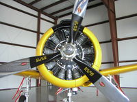 N128JC @ KLVN - Julie Clark's T-28 parked inside the ARC Hangar. - by Mitch Sando