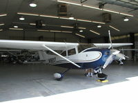 N182XT @ KLVN - Parked inside the maintenance hangar. - by Mitch Sando