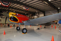 N1195N @ S67 - Parrot head P40 on display at Warhawk Air Museum. - by Bluedharma