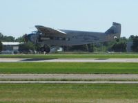 N8407 @ OSH - Landing on 36 at Airventure 2008. - by Bob Simmermon