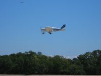 N8718W @ OSH - Landing on 36 at Airventure 2008. - by Bob Simmermon