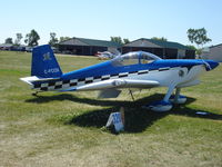 C-FCOX @ KOSH - RV-7 - by Mark Pasqualino