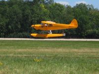 UNKNOWN @ OSH - Cub on floats departing RWY 36 at Airventure 2008 - Oshkosh, WI - by Bob Simmermon