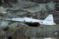 J-3058 @ LSMJ - After take off the F-5 stays well low when it passes the village of Turtmann. What about jet noise..? - by Joop de Groot