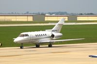 N824LX @ CID - Seen from my office window, taxiing out to runway 27 - by Glenn E. Chatfield