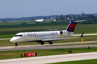 N918CA @ CID - Taxiing on Alpha to the ramp.  Looking through my dirty window.