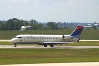N925EV @ CID - Taxiing on Alpha to the ramp.  Looking through my dirty window.