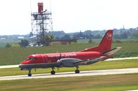N448XJ @ CID - Taxiing on Alpha to the ramp.  Looking through my dirty window. - by Glenn E. Chatfield