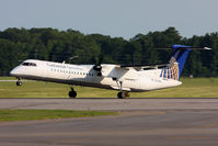 N190WQ @ ORF - Continental Connection (operated by Colgan Air) N190WQ (FLT CJC3227) departing RWY 5 enroute to Newark Liberty Int'l (KEWR). - by Dean Heald