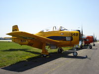 N128JC @ KOSH - North American T-28C - by Mark Pasqualino