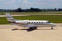 N560JF @ CID - Taxiing to Landmark FBO, as seen from my office window. - by Glenn E. Chatfield