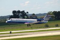 N593ML @ CID - Lifting off Runway 9 for ORD