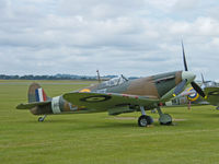 G-AIST @ EGSU - Spitfire F.1A/Out on the Grass at Duxford - by Ian Woodcock