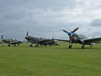 F-AZKU @ EGSU - Curtiss P-40N/Duxford (At the head of an impressive line up) - by Ian Woodcock