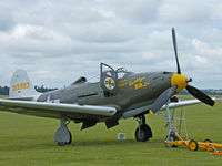 G-CEJU @ EGSU - Bell P-39Q6/Out on the grass at Duxford. - by Ian Woodcock