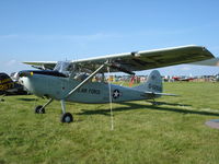 N60604 @ KOSH - Cessna/Air Repair 305F - by Mark Pasqualino