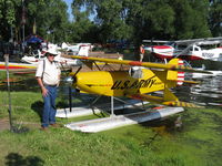 N2505P @ 96WI - 2006 Knapp MICRO MONG SPORT, Rotax 582 65 Hp, Shown with me for size comparison. Thank you George Lazik!. - by Doug Robertson