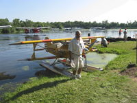 N2505P @ 96WI - 2006 Knapp MICRO MONG SPORT, Rotax 582 65 Hp. Shown with George for size comparison. - by Doug Robertson
