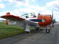 C-GKKD @ KOSH - North American T-28B - by Mark Pasqualino
