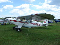 N9957Q @ KOSH - Piper PA-18-135 - by Mark Pasqualino