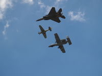 UNKNOWN @ KOFF - HARITAGE FLIGHT, A-10, P-40 AND F-15.  VERY TOUCHING IF YOU KNOW WHAT HARITAGE FLIGHT STANDS FOR. - by Gary Schenaman