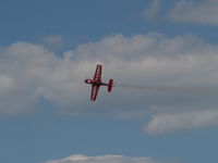 N71GP @ KOFF - GREG POE DOING AN KNIFE EDGE - by Gary Schenaman