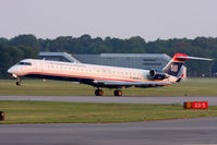 N913FJ @ ORF - US Airways Express (operated by Mesa Airlines) N913FJ (FLT ASH2665) departing RWY 5 enroute to Charlotte/Douglas Int'l (KCLT). - by Dean Heald