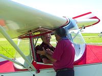 ZK-JLO - Rob Germon discussing test flying with James Lobet - by Grace Bloomfield