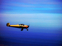 N99907 - N99907 in flight - by M.C. Ritter