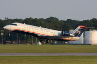 N416AW @ ORF - US Airways Express (operated by Air Wisconsin) N416AW (FLT AWI4046) departing RWY 5 enroute to Washington Reagan National (KDCA).